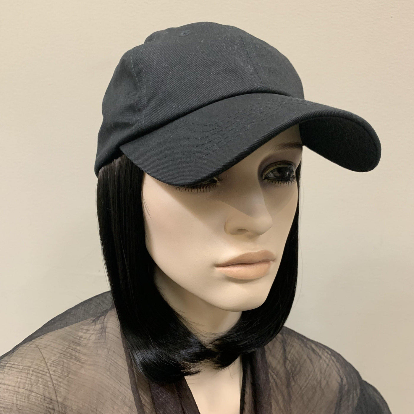 Hat with shoulder length hair attached