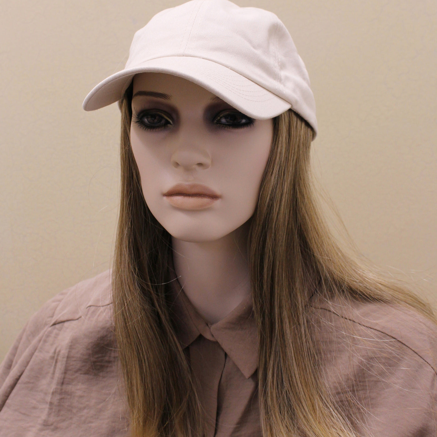 Hat with long blonde hair attached